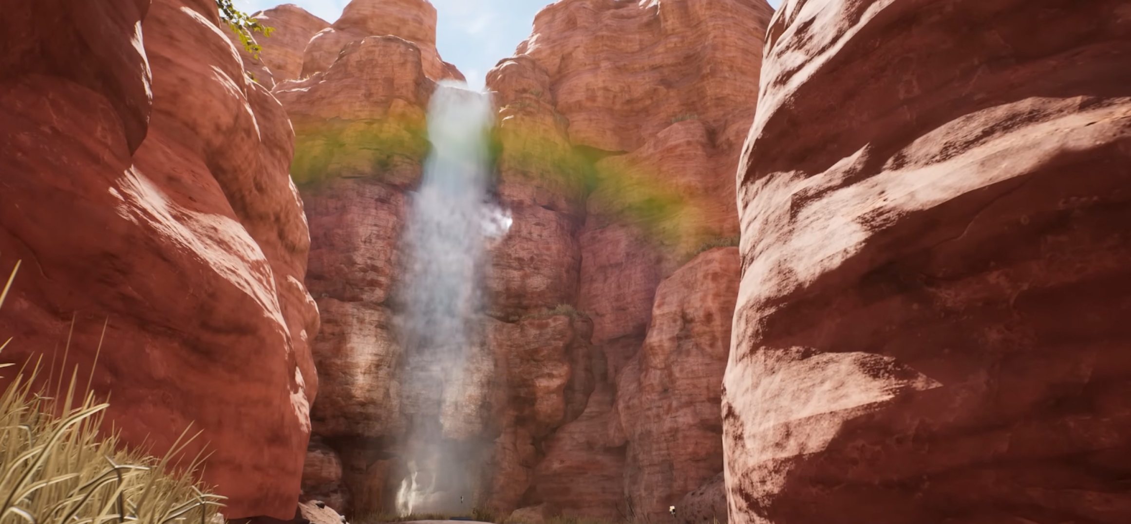 Red rock canyon with waterfall environment showcasing advanced visuals from March 2024